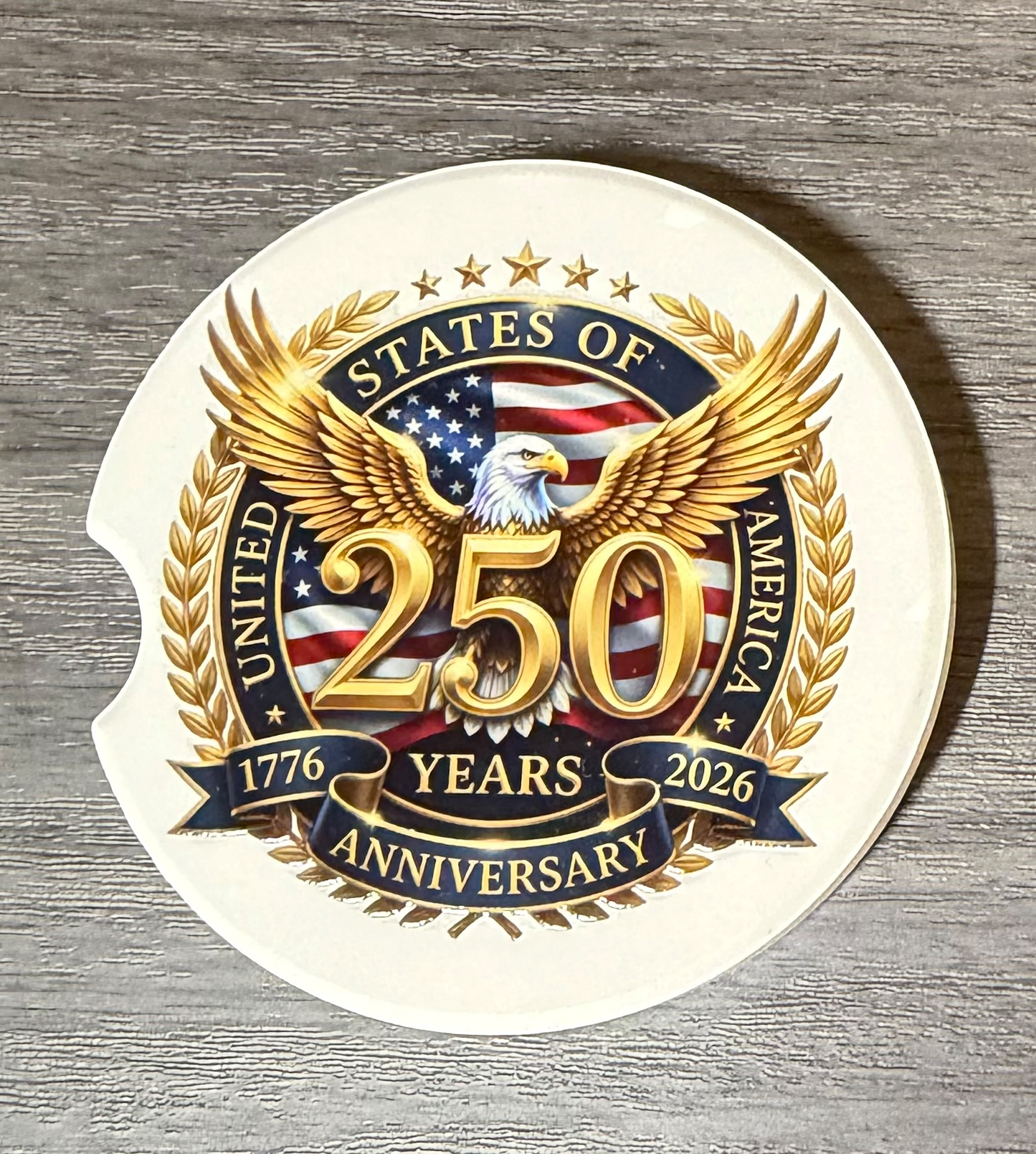 250th USA Anniversary 2B Ceramic car coasters, designed to fit most cup holders, are absorbent and help keep cars clean. They feature a vibrant design and are a great gift for car lovers.