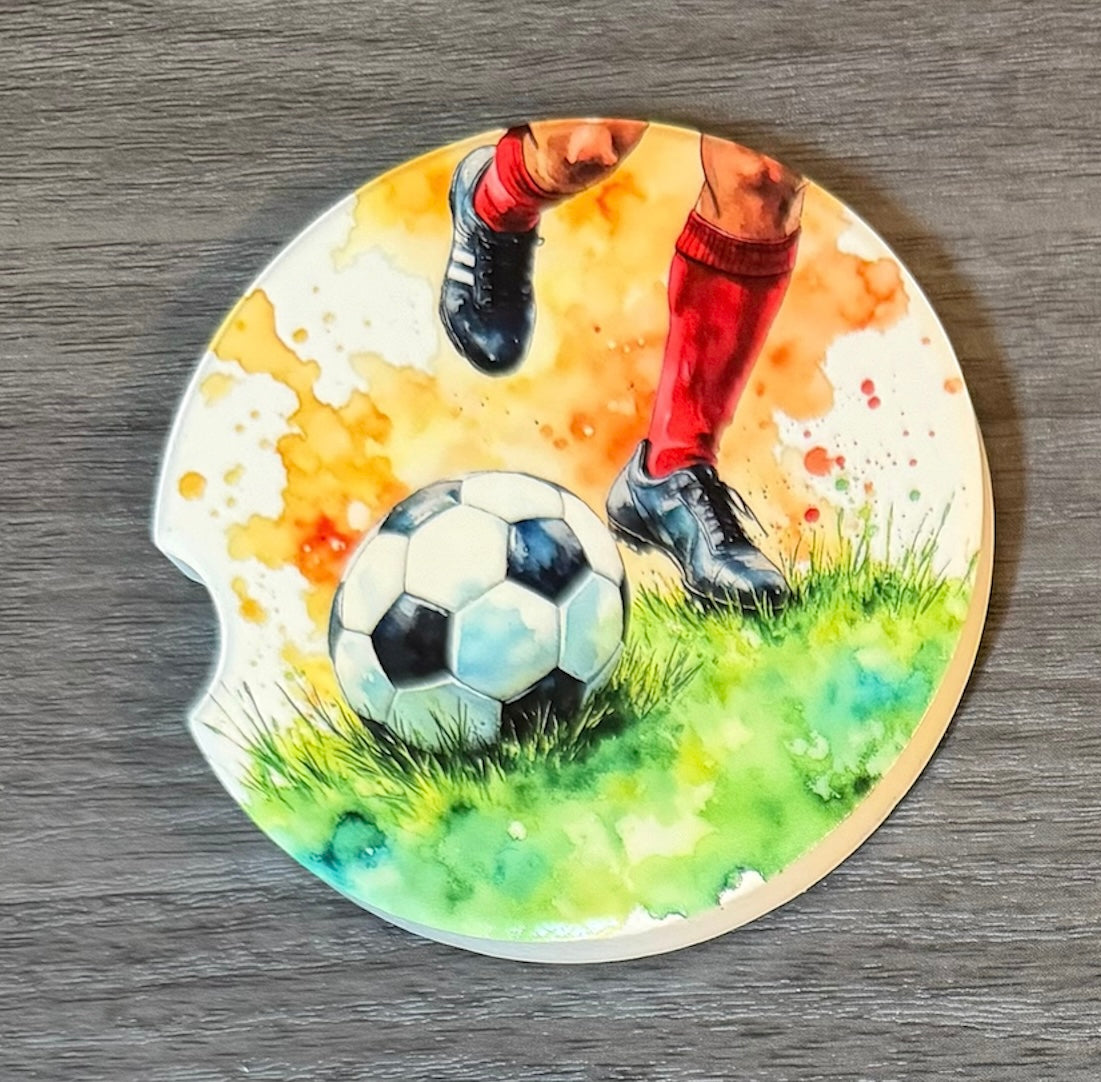 Soccer Sporting Ceramic car coasters, designed to fit most cup holders, are absorbent and help keep cars clean. They feature a vibrant design and are a great gift for car lovers.